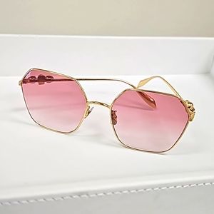 Alexander McQueen pink sunglasses with Swarovski crystals